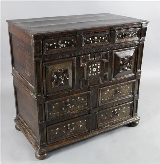 A late 17th century mother of pearl inlaid oak chest, W.3ft 2.5in. D.1ft 9in. H.3ft 1in.